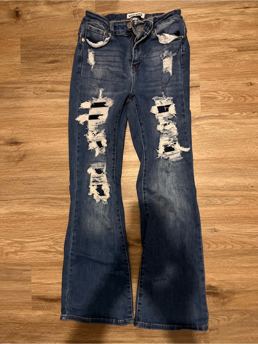 Ripped Dark Blue Flare Jeans for Women